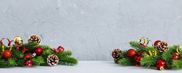 Wall Mural - New Year Christmas tree toy, branches of a christmas tree, New Year decorations on a colored background