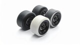 Four skateboard or longboard wheels with three black and one white arranged on minimal surface with visible bearings for editorial product showcase gear contrast and urban lifestyle-themed visuals