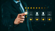 © Saniya Digital - Business man touching virtual screen to rate satisfaction customer service evaluation concept five star symbol to increase confidence best excellent services rating