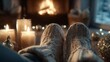 © imagemir - A cozy scene featuring a pair of knit socks in front of a crackling fireplace, surrounded by soft candlelight and festive décor.