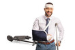 © Ljupco Smokovski - Young man with a broken arm and bandage on head recovering after an electric scooter accident