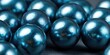 © Naufal - Close-up shot of multiple shiny, blue spheres with reflective surfaces, grouped together