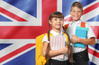 © New Africa - Children with backpacks and notebooks against flag of United Kingdom. Language school