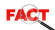© trendee - Magnifying glass examining the word fact in red on a white background