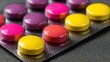 © Fauzerene - Assortment of colorful pills inside a sealed blister pack
