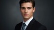 © The 2R Artificiality - Professional portrait of a young businessman with a focused expression wearing a suit and tie against a dark background. Soft lighting highlights facial features.