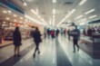 © The 2R Artificiality - Blurred interior view of a department store within a shopping mall featuring indistinct crowds and merchandise displays creating a soft focus effect.