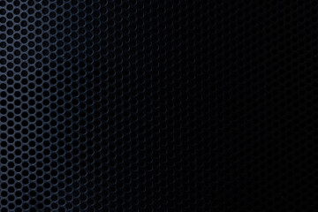 Black macro speaker surface,Safety net on the music speaker. Protective grid audio speakers. Close view of Black safety net. Metal perforated mesh, abstract pattern, Abstract black background.