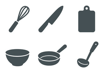 Silhouette of kitchen utensils on dark background