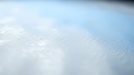 Soft rippling water surface creates tranquil abstract pattern motion