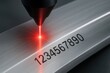 © hobonski - Laser Marking on Metal Profile for Structural Production. A high-precision laser marking system engraves identification numbers on a metal profile, a key step in tracking and structuring metal profile