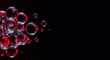 © Argent - A cluster of transparent spheres illuminated by red and blue neon light against a dark background. Abstract futuristic 3D rendering with copy space.