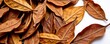 © retirementfun - Close-up of dried tobacco leaves isolated on a pure white background, showing rich brown textures and details, still life, dried leaves