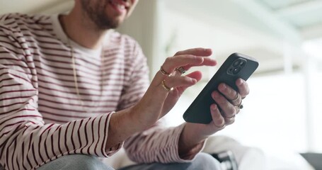 Hands, typing and man with smartphone, lounge and communication with contact, social media or online. Happy, texting and person with mobile for message, scroll and networking with tech on web or home
