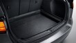 © Tyrah - Interior car trunk space with rubber floor mat for protection and durability