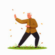 © Indhgraphy Visual - An elderly man practices Tai Chi outdoors, showcasing a graceful movement amidst falling autumn leaves, promoting wellness and tranquility.