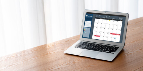 Wall Mural - Calendar on computer software application for modish schedule planning for personal organizer and online business