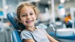 © pinkrabbit - young girl is sitting in a dentist's chair. Children is smiling and enjoying her visit to the dentist,dentistry, clinic, dental
