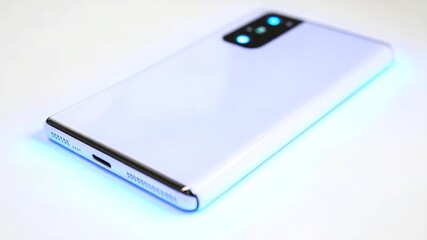 A close-up shot of a cell phone on a table, showing the device's screen and buttons