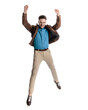 © Viorel Sima - cheerful young man holding arms above head, jumping and celebrating
