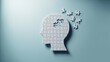 © Dream Studio - Human head silhouette made of jigsaw puzzle pieces on blue background, symbolizing memory loss, dementia, or cognitive decline concept