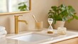 © Jane_S - Modern bathroom vanity with gold faucet and greenery