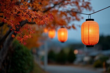 Wall Mural - Japanese autumn lanterns among colorful maple leaves during dusk
