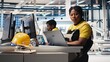 © DC Studio - Black woman technician testing solar panel designs on industrial software, working in alternative energy manufacturing plant. Female engineer optimizing the production line. Camera B.
