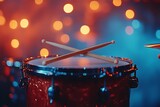Close up of drum kit with crossed sticks and bokeh lights stage performance music high resolution photo