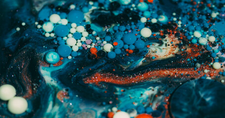 Wall Mural - Oil background. Paint bubbles. Defocused orange blue purple color ink marble water round glitter texture flowing on acrylic art abstraction.