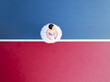 © AmazingAerialAgency - Aerial view of a ballerina in a white tutu, a stark contrast against the vibrant red and blue backdrop, creating a mesmerizing balance of color and form, Adelaide, South Australia, Australia.