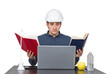 © 1STunningART - Stressed young man engineer wearing white helmet, sitting at the working desk looks confused in his laptop as holds books in both hands, isolated on transparent background