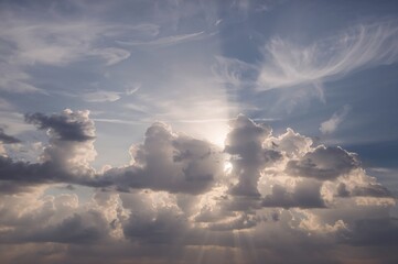 Wall Mural - Expansive perspective of a sunlit sky filled with clouds