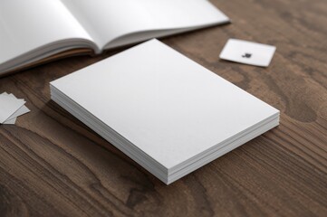 Wall Mural - Pile of clean paper sheets for brochure on wooden surface. Mockup