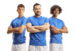 © Ljupco Smokovski - Three football players in blue jerseys posing