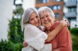 © Halfpoint - Portrait of beautiful adult daughter with old mother.