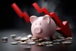© Denis Tuev - Pink piggy bank surrounded by scattered coins, with a downward trending red arrow in the background, symbolizing financial decline and economic challenges in personal finance management