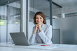 © Stock 4 You - European smiling senior businesswoman entrepreneur working on pc sitting at desk, looking at camera portrait. 40s mature Latin hispanic business woman ceo manager using laptop computer in office