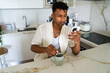 © mahalo studio/Stocksy - man drinking coffee
