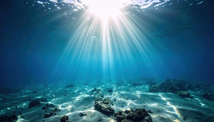 Wall Mural - Sunlight filtering through clear ocean water, illuminating sandy seabed with coral formations below
