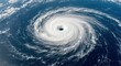 © Roshan - Majestic, powerful hurricane swirl captured from space, demonstrating nature's immense force and beauty over deep blue ocean waters with wispy clouds