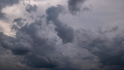 Wall Mural - dark sky with stormy clouds. dramatic sky rain,dark clouds before a thunder-storm,clouds before rain