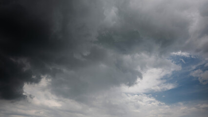 Wall Mural - dark sky with stormy clouds. dramatic sky rain,dark clouds before a thunder-storm,clouds before rain