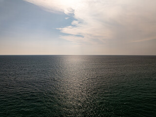 Wall Mural - Beautiful sky sunset or sunrise clouds over sea nature background