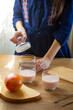 © Mallivan - Preparing chia pudding with mango and yogurt drinks