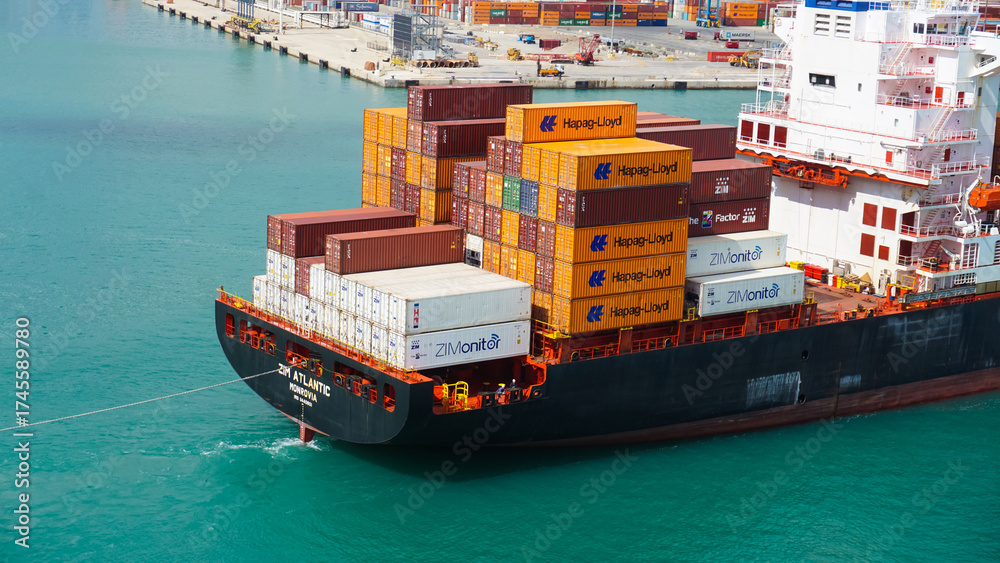 Spanish Container Ship Barcelona, Spain - September 26, 2025: Cargo containers Hapag-Lloyd ...