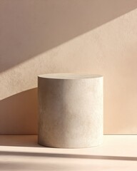 Canvas Print - Empty Cylindrical Stone Pedestal Against Light Sandstone Wall