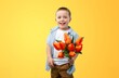 © BillionPhotos.com - Child with beautiful bouquet of tulips. Women's Day.