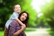 © BillionPhotos.com - Happy young mother and child in park