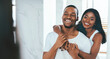 © Prostock-studio - Romantic Young African American Couple Embracing Near Mirror In Bathroom, Happy Black Millennial Man And Woman Hugging And Smiling To Their Reflection, Making Morning Beauty Routine Together